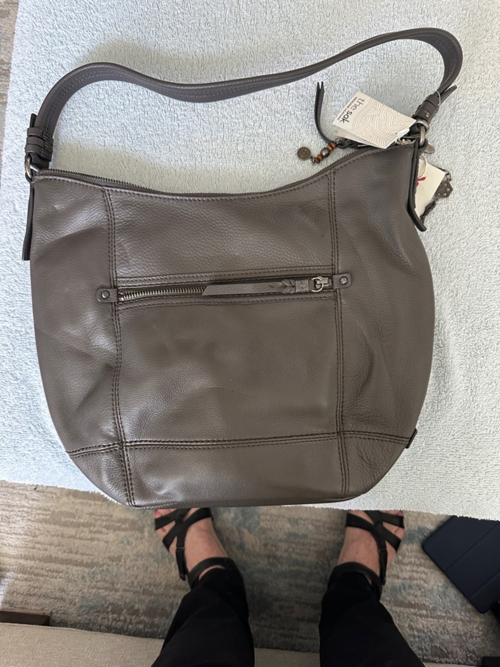 The Sak Genuine Leather purse.  Never used.  Slate color.